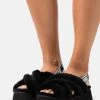 Ugg Disco Cross Slide - Tøfler - Black -Ugg på nett 42ed0fa8931e44ce8edf31223c44e6b1