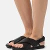 Ugg Solivan Slingback - Sandaler - Black -Ugg på nett c734cb011b774e9e897d4029b953c730